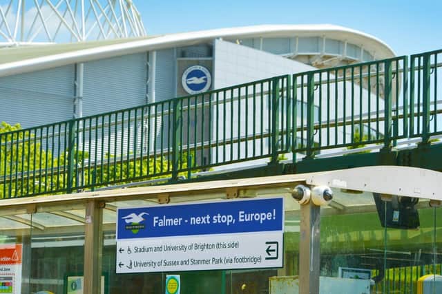 Falmer's new direction signs have been decorated to celebrate Brighton and Hove Albion's European qualification