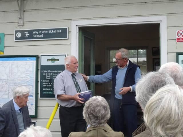 The retiring Mick Newman is thanked by Paul Nicholson of Plumpton Station Partnership