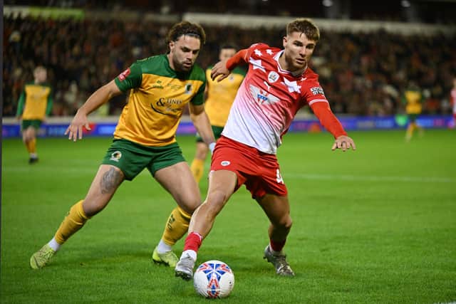 BARNSLEY, ENGLAND - NOVEMBER 03:  John McAtee of Barnsley  in action during the Emirates FA Cup First Round match between Barnsley and Horsham at Oakwell Stadium on November 03, 2023 in Barnsley, England. (Photo by Ben Roberts Photo/Getty Images)