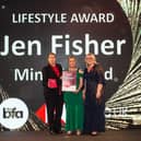Jen Fisher, owner of Mini First Aid (Sussex) receives her award from Pip Wilkins and Gillian Morris