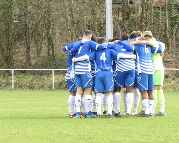 Roffey, pictured in a pre-match huddle earlier this month, chalked up their first away win of the season, at Saltdean | Picture: Beth Chapman