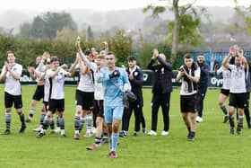 Bexhill United players celebrate their superb win at Hordnean | Picture: Joe Knight