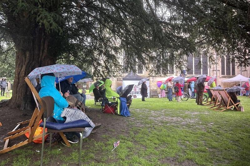 This photo sums up the English experience! Residents didn't let the rainy weather stop them from witnessing the King's Coronation.