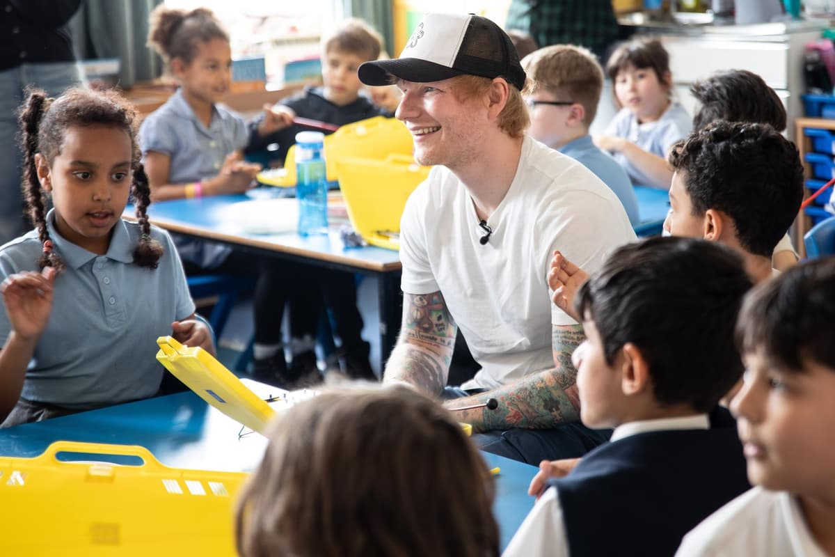 Pop superstar Ed Sheeran makes surprise visit to Brighton school