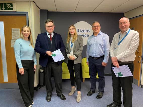MP Jeremy Quin (second from left) visits Citizens Advice