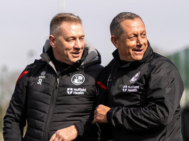 Scott Lindsey and assistant Neil Smith have a bit of fun on the first of training after Lindsey's reappointment.