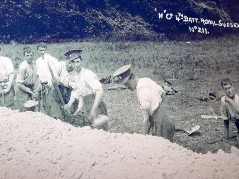 Soldiers of the Royal Sussex Regiment digging training trenches