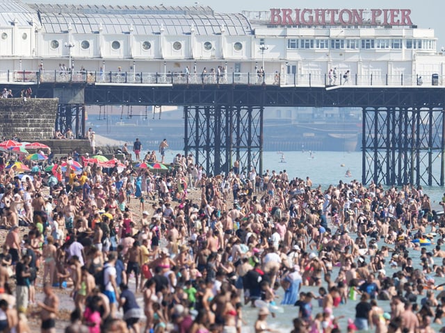 Thousands of people flocked to Brighton beach today (September 9) as temperatures reached 32C across parts of the county.