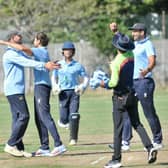 Captain Nick Ballamy celebrates with wicket-taker Harry Dunn | Picture: Stephen Goodger
