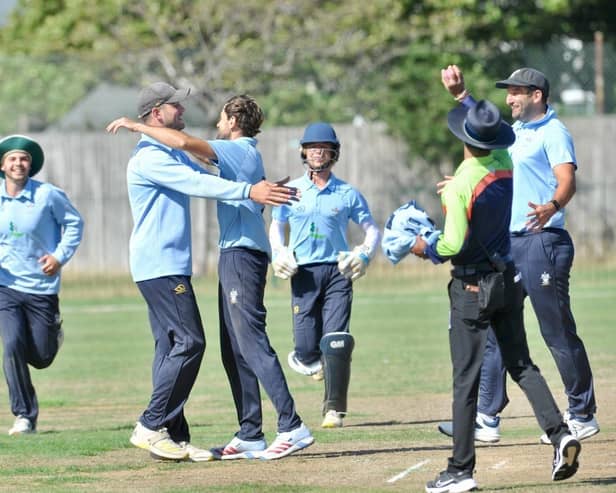 Captain Nick Ballamy celebrates with wicket-taker Harry Dunn | Picture: Stephen Goodger
