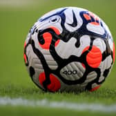 NORWICH, ENGLAND - AUGUST 28: A view of a match ball during the Premier League match between Norwich City and  Leicester City at Carrow Road on August 28, 2021 in Norwich, England. (Photo by Stephen Pond/Getty Images)