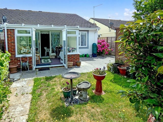 This two-bedroom bungalow in Beaumont Park sits perfectly between Littlehampton and Rustington in a quiet, off-road position. It is on the market with Glyn Jones at £375,000.
