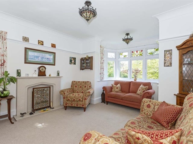 This end-of-terrace, five-bedroom property is on a corner plot in Grand Avenue, just a short walk from the town centre and yards from the beach. It has come on the market with Robert Luff & Co priced at £850,000.