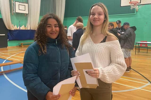 Students from The Sir Robert Woodard Academy collecting their results