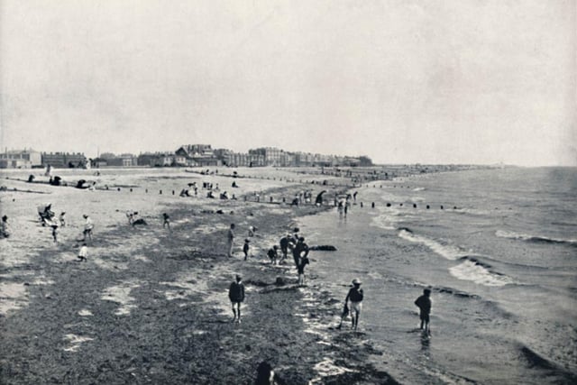 Paddling at low tide in 1895.