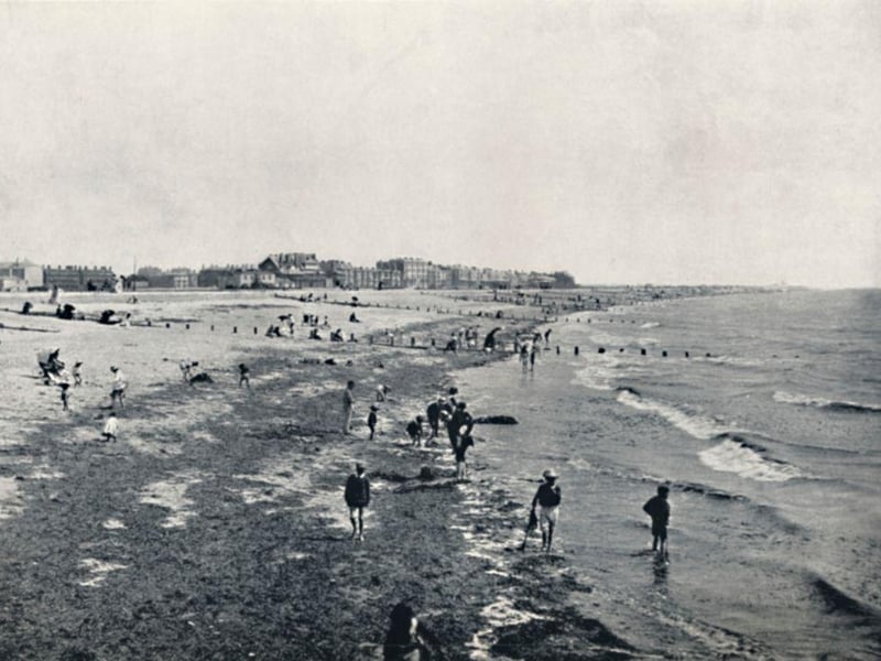 Paddling at low tide in 1895.