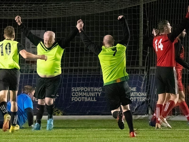 Action in the charity football match held at Worthing Football Club for Cancer Research UK