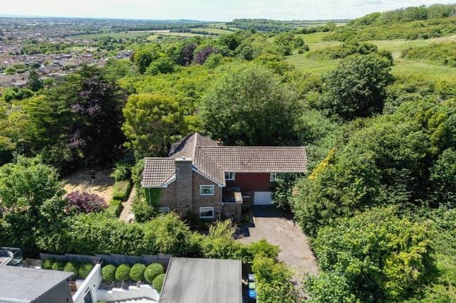 This substantial detached family house sits on the highest point in North Lancing, with grounds totalling 0.5 acres of land. Offers in the region of £1million are invited for this four-bedroom property at the foot of the South Downs National Park, with magnificent panoramic coastal views.