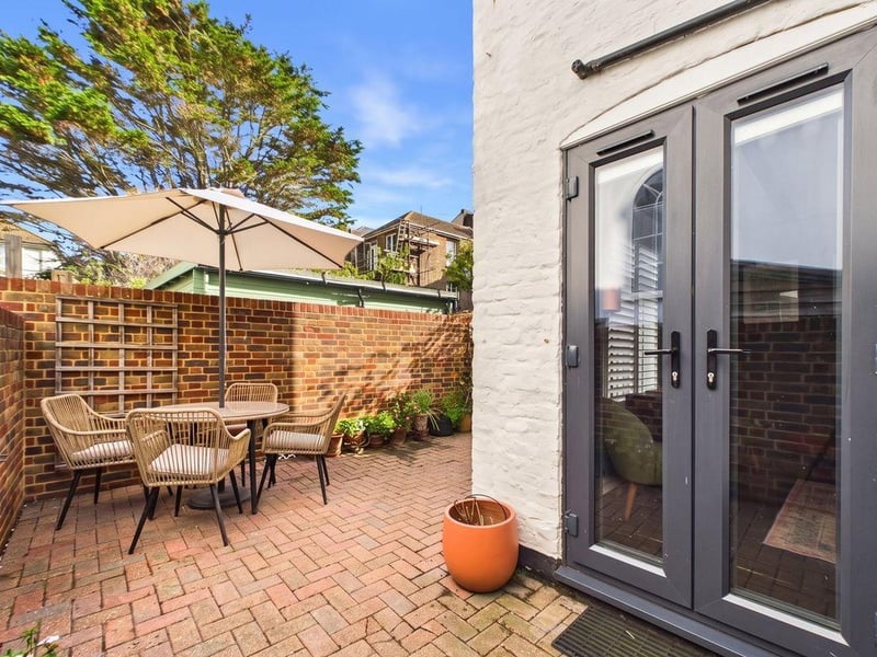 The secluded garden, designed with low maintenance in mind, is a rare feature in this location
