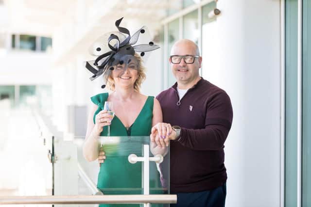 Linda Goode modelling a John Boyd hat named Royal Wave.