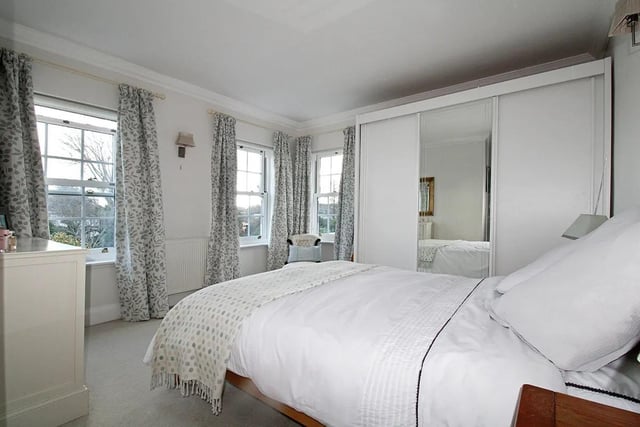 One of four beautifully appointed bedrooms.