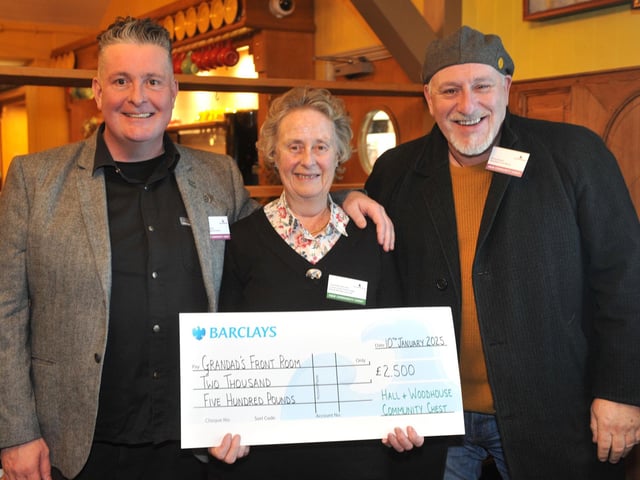 Grandads Front Room with judge Tessa Woodhouse, receiving £2,500 to help fund a warm space in the winter and a People’s Pantry