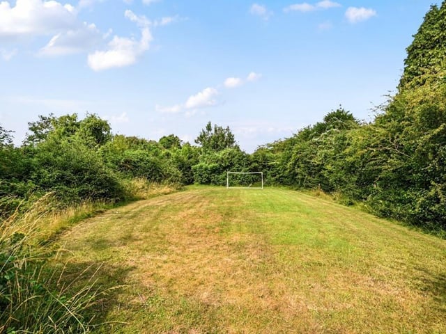The property's garden is just over three acres in size