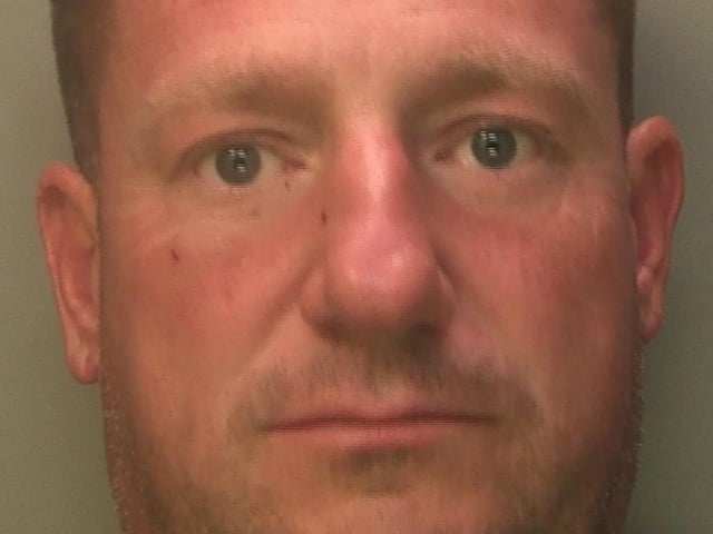A masked man has been jailed again after police prevented a ram raid burglary at a store in a West Sussex village. Alfie Smith was among an organised gang who used a stolen JCB to smash into the Co-Op in The Square, Barnham, in the early hours of 4 July. But their plan to take the cash machine and its contents was scuppered as police swiftly responded to a report of a theft of a telehandler at a nearby yard. Using local knowledge and suspecting the vehicle may be used for criminal activity, they carried out a search of known ATMs in the area, which led them to the scene. As they arrived, two suspects were able to make off in a stolen vehicle, but Smith was detained following a short foot chase. This footage shows the moments which led to the arrest of the 43-year-old, of Staines Road West, Ashford, Middlesex. He was subsequently charged with trespassing with intent to steal and aggravated taking of a motor vehicle without the owner’s consent, and remanded in custody. He pleaded guilty to both offences and was sentenced to six years’ imprisonment at Lewes Crown Court on 2 August. However, the offence was committed while Smith was on temporary release from prison, where he was serving a 14-year sentence for a series of similar offences which he was convicted of in 2019. He was therefore ordered to serve the remaining 10 years of that sentence on top (16 years total).