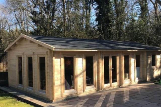 The log cabin in the garden of a property in Faygate, near Horsham, is being used as a childcare base