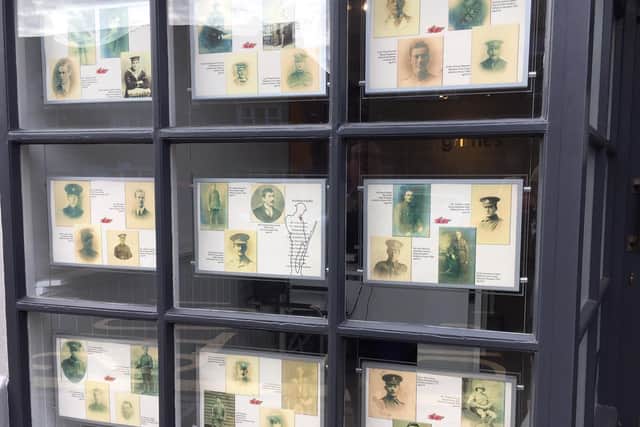 Marcus Grimes Estate Agents in Cuckfield is displaying the portraits of 81 residents who died in World War I