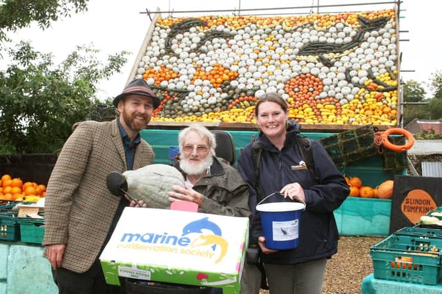 Installer Mark Ford, owner Robin Upton and Kate Witton (Marine Conservation Society) in 2019