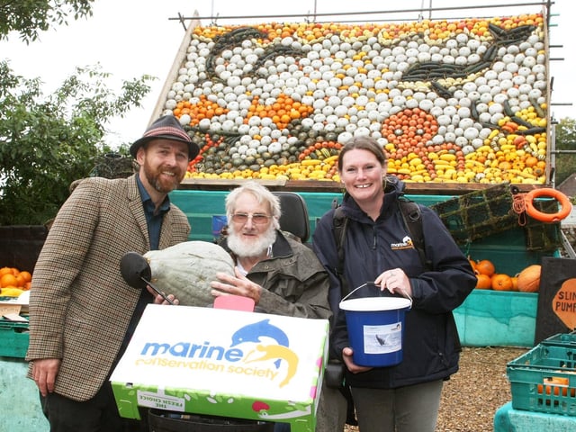 Installer Mark Ford, owner Robin Upton and Kate Witton (Marine Conservation Society) in 2019