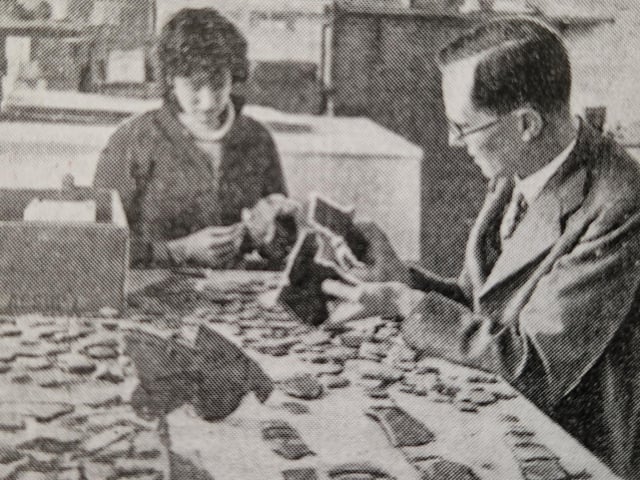 Dr Curwen and Miss Cecily Preston, who later became known as Peggy Piggott, piecing together specimens of broken pottery excavated from an ancient camp in Brighton