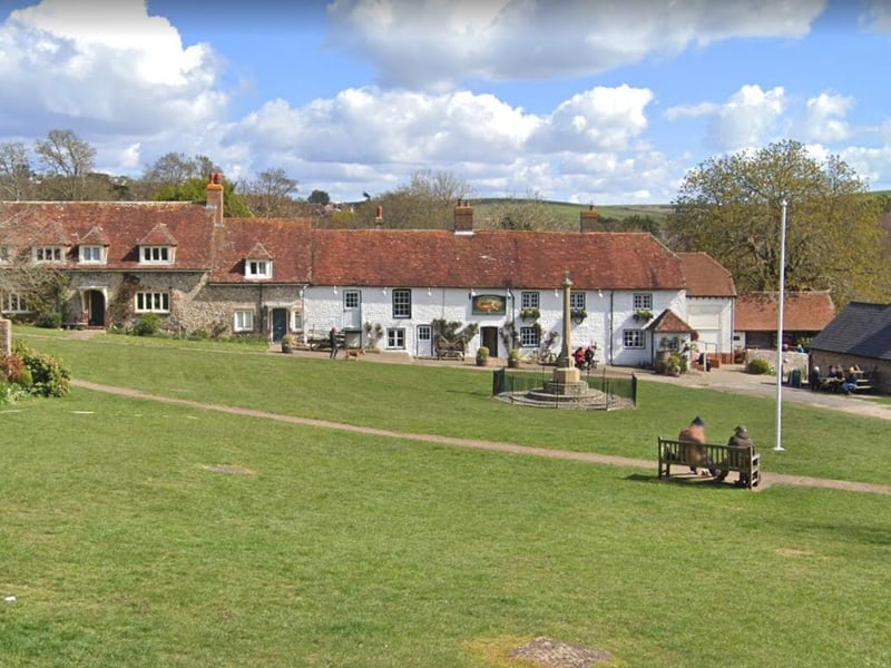 The Tiger Inn at East Dean, west of Eastbourne, is nestled in a South Downs valley and overlooks a village green.