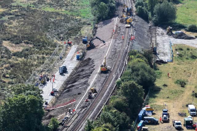 Work on repairing the railway track, seen from above on Thursday, August 27, after the derailment near Lewes. Photo: Eddie Mitchell