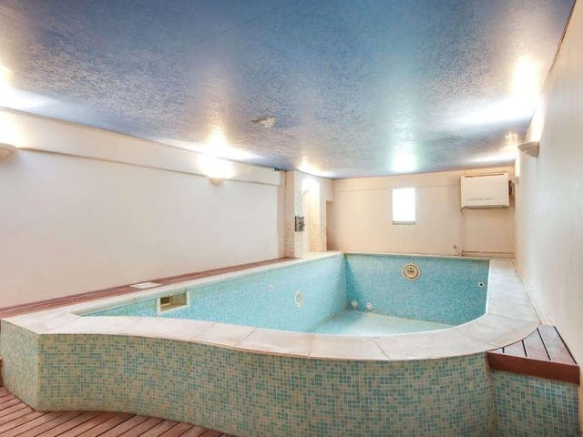 Steps descend to the lower ground floor which has a flagstone floor and leads on to a leisure suite, comprising a wine store, heated indoor pool and a changing room with shower, basin, separate WC and sauna. The boiler/plantroom offers useful cellar storage