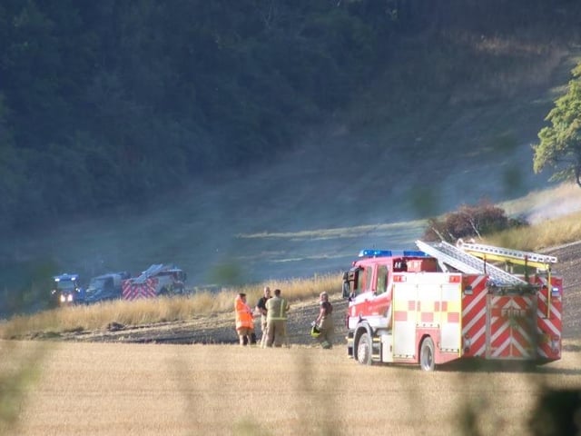 Firefighters successfully extinguished a fire in a field at Upwaltham, close to the A285. Photo: Jack Chiverton