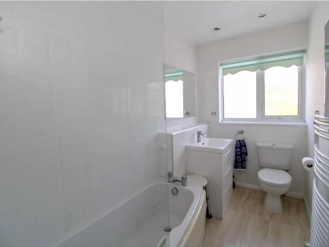 On the first floor are three bedrooms, family bathroom, en-suite shower room and balcony with far reaching views to Seaford Head, town centre and Sea.