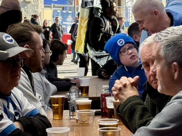 Brighton fans enjoy the Terrace prior to the match