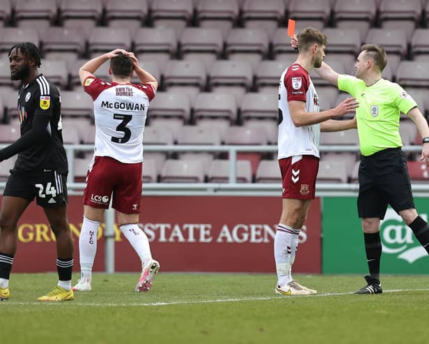 Referee Ross Joyce shows a Red Card to Aaron McGowan of Northampton Town against Crawley Town. (Photo by Pete Norton/Getty Images)