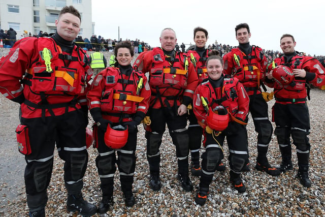Some 385 people braved the ice cold sea water on New Year's Day 2024. Members of the West Sussex Fire and Rescue service on duty