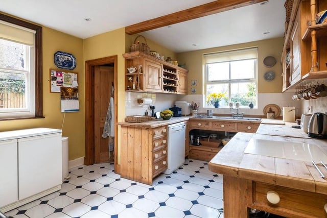 The kitchen is traditionally fitted and it has a two oven gas aga. Off of the kitchen is a downstairs cloakroom and utility.