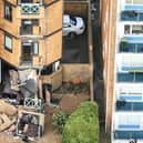 Residents in an East Sussex town have described their shock after two balconies collapsed at a residential block in the middle of Christmas celebrations.