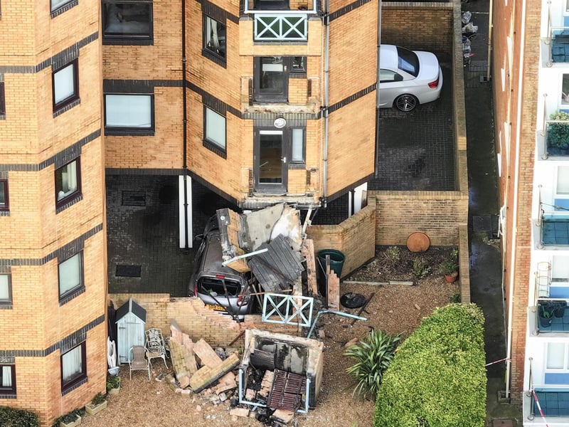 Residents in an East Sussex town have described their shock after two balconies collapsed at a residential block in the middle of Christmas celebrations.