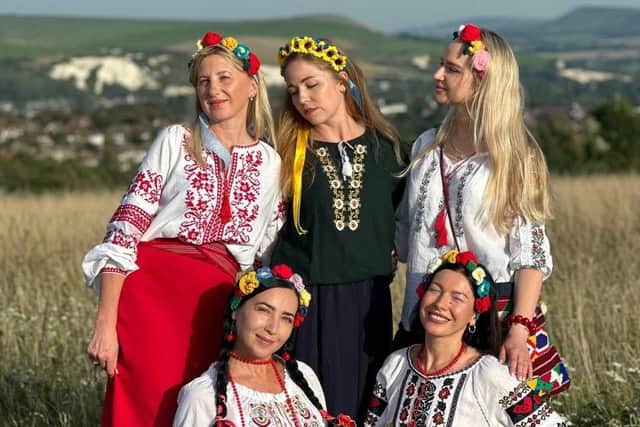 TThe organisers of 'A Celebration of Ukrainian Culture' pictured on the hills near Lewes