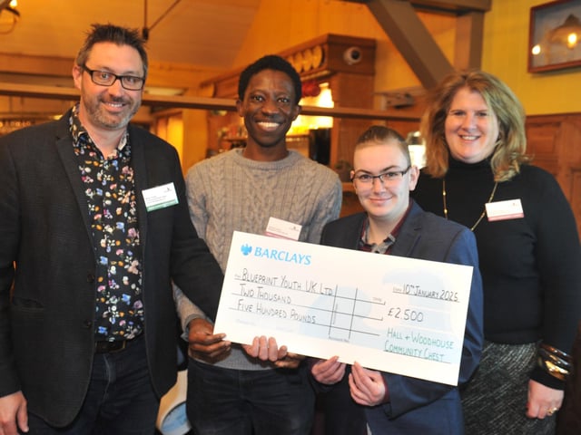 Blueprint Youth UK, with judge Steve Young, left, receiving £2,500 to provide one-to-one coaching support