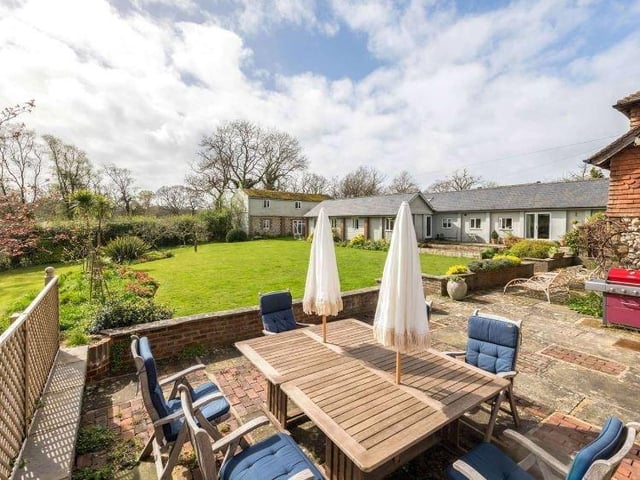 Adjoining the house is a spacious south facing terrace which creates a superb area for entertaining al fresco