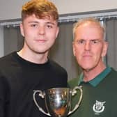 Keeper Ryan Hall - seen here receiving the supporters' player of the year trophy from Dave Seabourne - has signed on for another season | Picture: Lyn Phillips