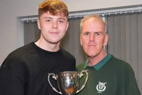 Keeper Ryan Hall - seen here receiving the supporters' player of the year trophy from Dave Seabourne - has signed on for another season | Picture: Lyn Phillips