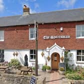 The Sportsman Inn at Amberley has reopened amid a battle by villagers to save the pub